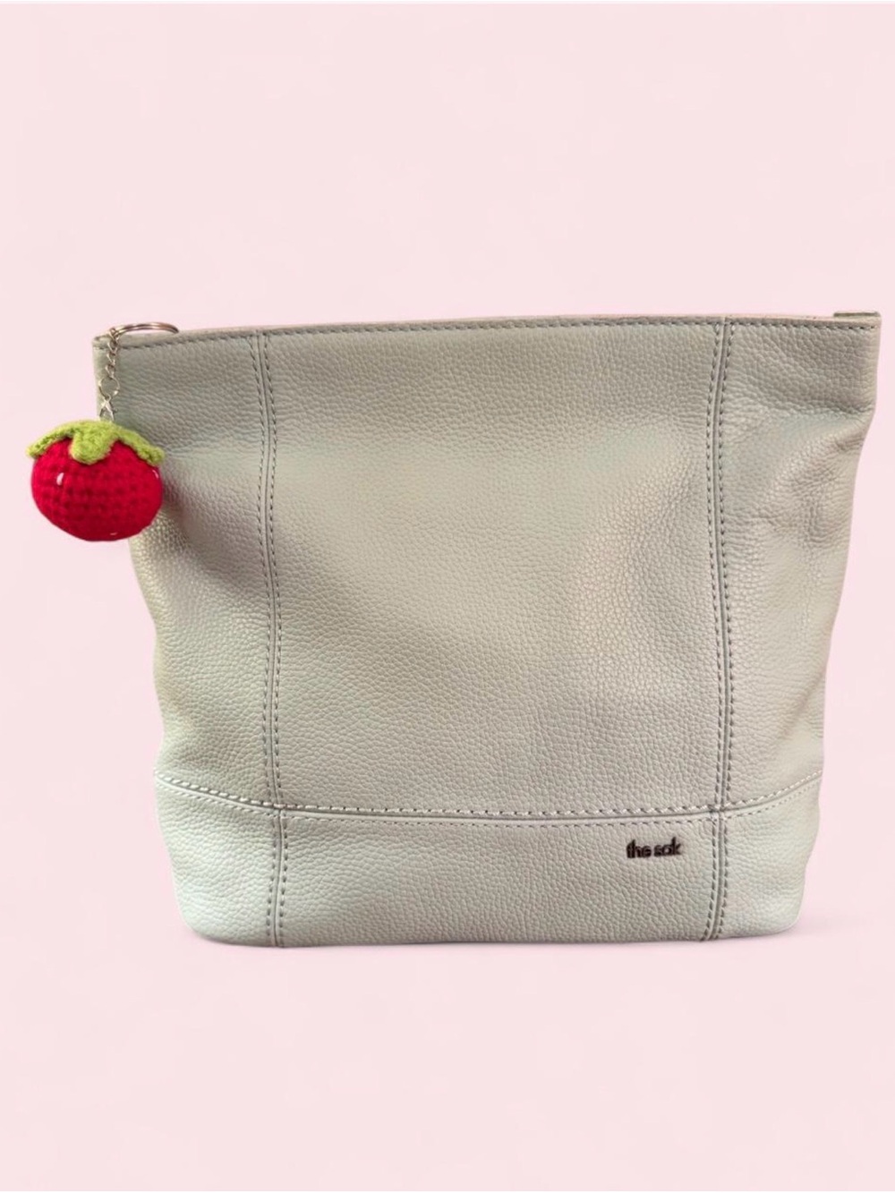 The Sak Mint Green Leather Pouch w/Crocheted Strawberry Charm